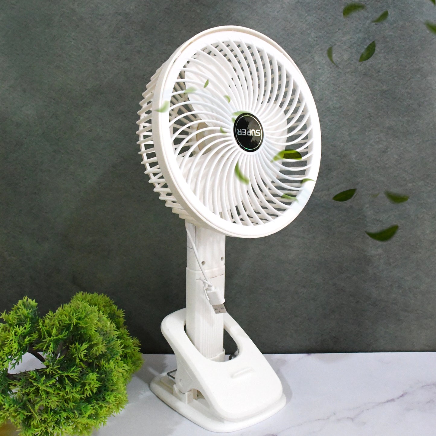 Wukusy multifunctional USB desk clip fan in brown box, compact home improvement fan with adjustable settings and modern design.