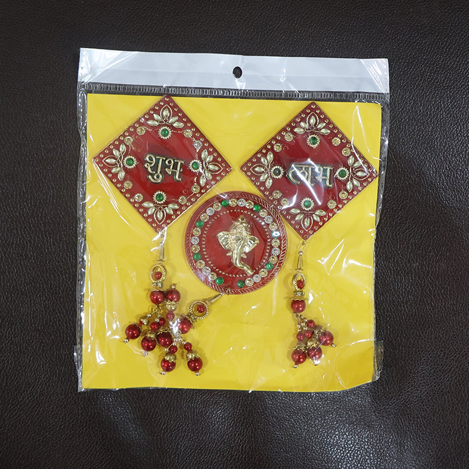 Decorative wall hanging set with Shubh Labh and Ganesh designs by Wukusy, featuring three colorful home decor pieces.