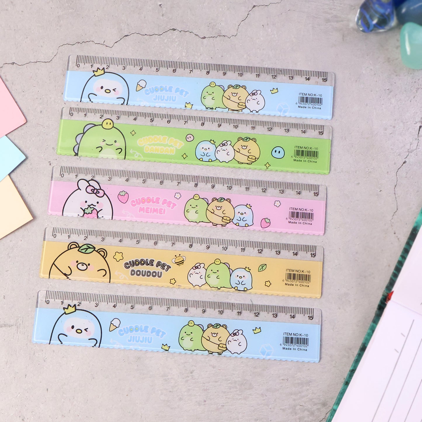Wukusy premium cartoon plastic ruler set for kids, 5-piece office ruler collection with colorful, fun designs for school and craft use.