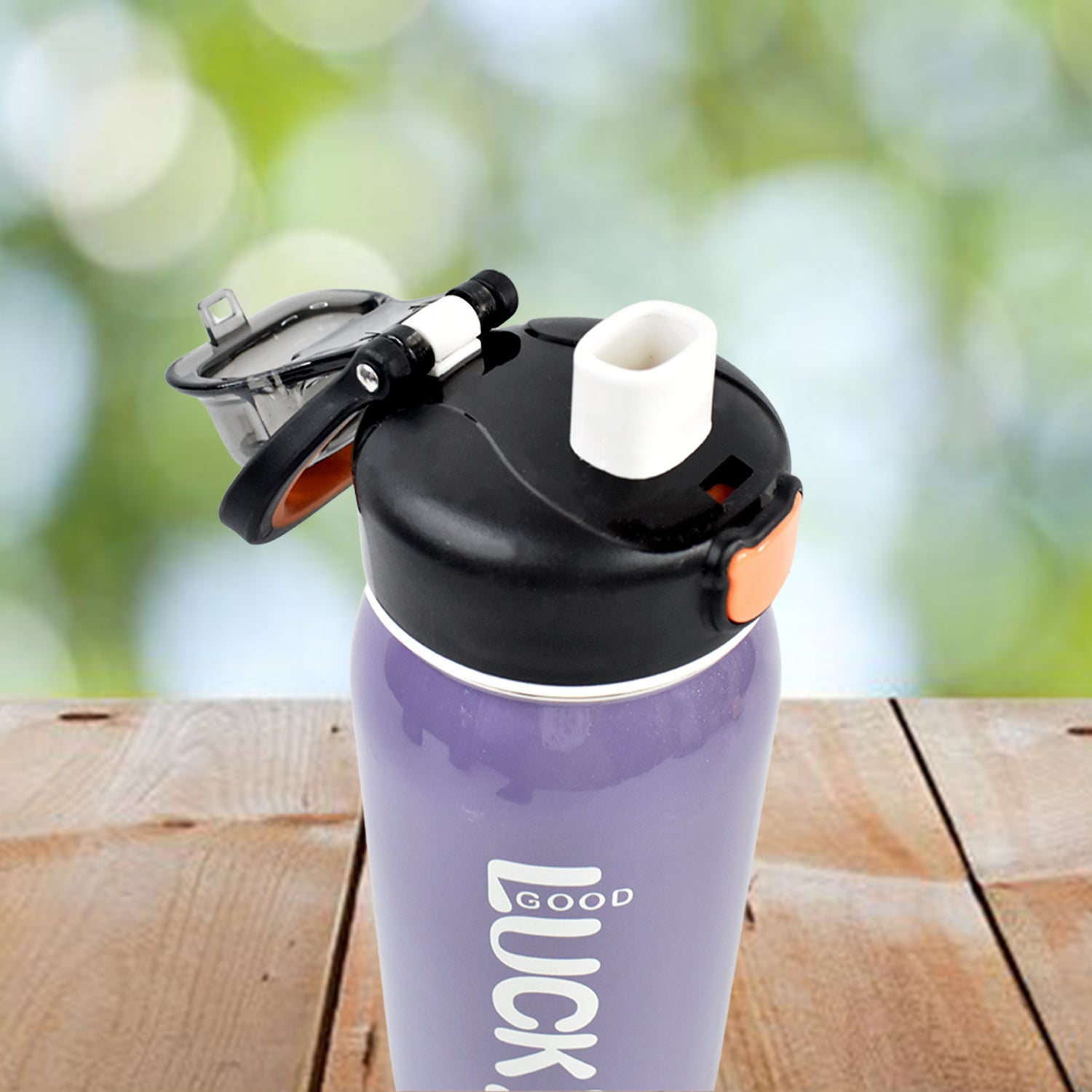 Stainless steel Wukusy 600ml water bottle with a colorful mixed design for home and kitchen use.