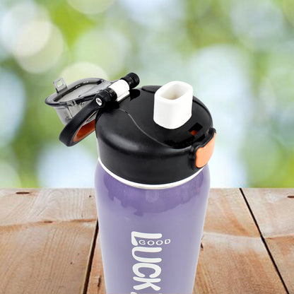 Stainless steel Wukusy 600ml water bottle with a colorful mixed design for home and kitchen use.