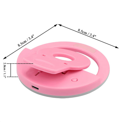 Wukusy 4785 Selfie Ring Light illuminating face for selfies and videos with bright, even lighting during content creation.