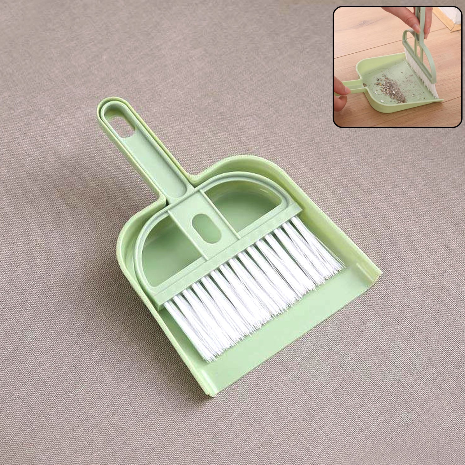 Wukusy 2-in-1 handheld cleaning dustpan with compact design and ergonomic handle for easy sweeping and debris collection.