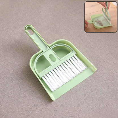Wukusy 2-in-1 handheld cleaning dustpan with compact design and ergonomic handle for easy sweeping and debris collection.