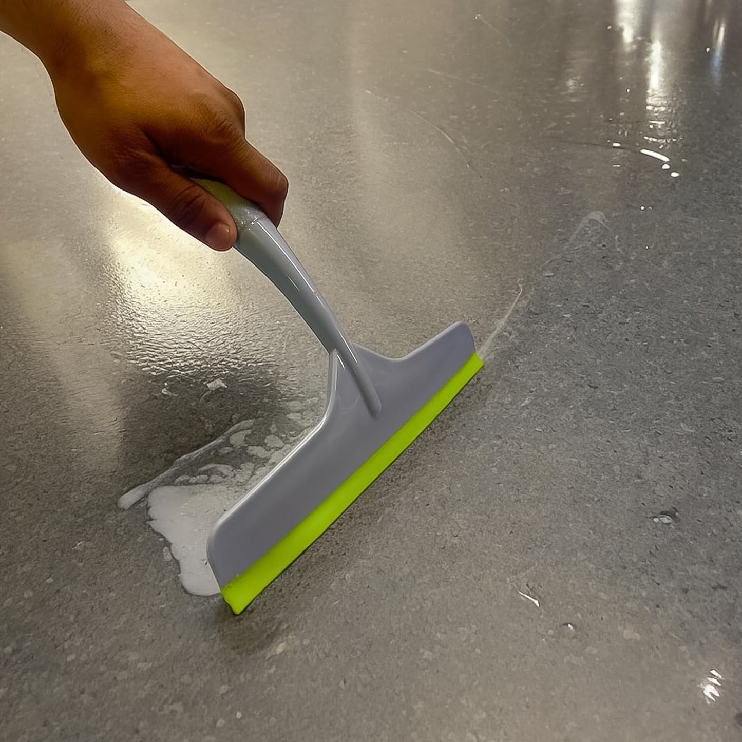 Grey plastic kitchen wiper from Wukusy, a versatile kitchen tool for cleaning and wiping surfaces.