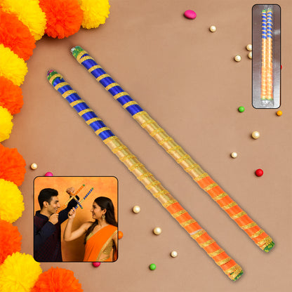 Pair of traditional decorative Dandiya sticks for Navratri Garba by Wukusy, featuring intricate designs and vibrant colors.