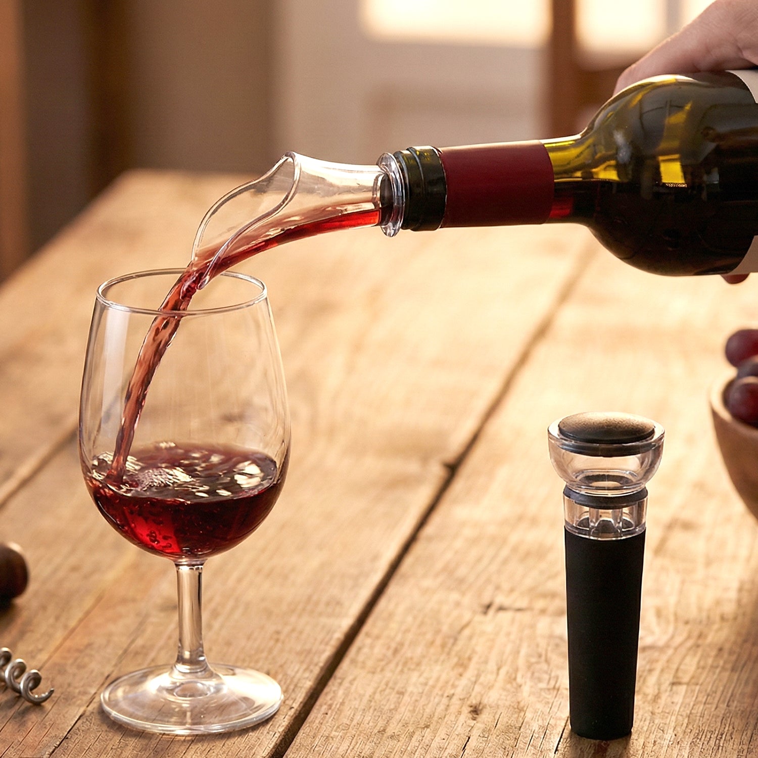 Wukusy premium wine pourer and vacuum bottle stopper set, 2-piece, with sleek design for preserving wine freshness and easy pouring.