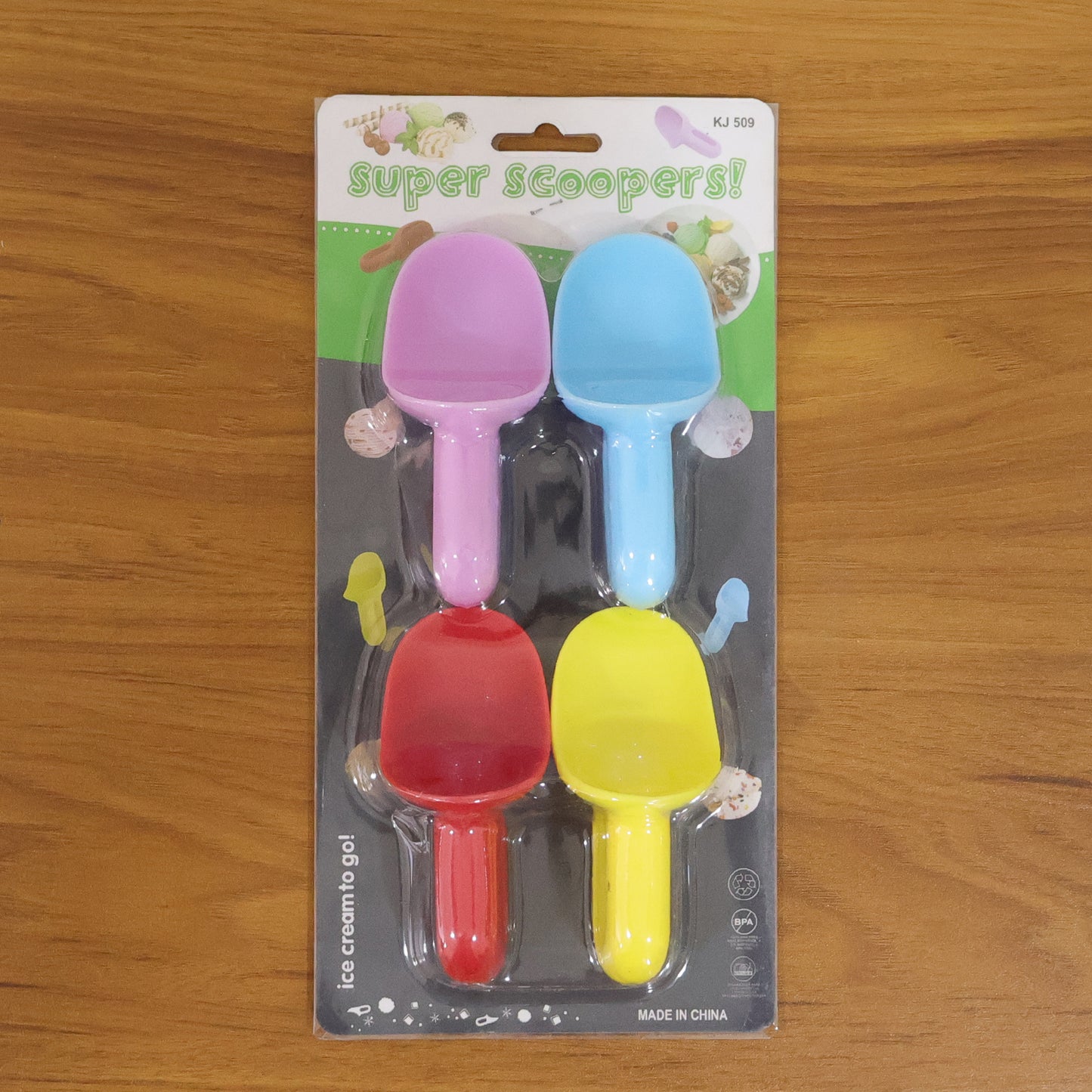 Wukusy 4-piece plastic ice cream scoop set showing colorful scoops and ergonomic handles for serving ice cream.