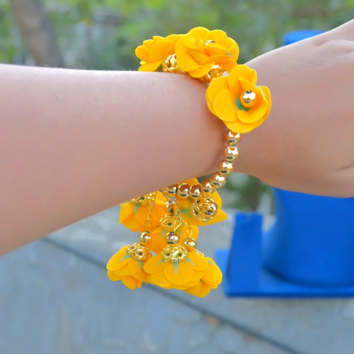 Traditional Wukusy Haldi Kada bracelet for pooja, showcasing intricate gold design and traditional Indian wrist ornament.