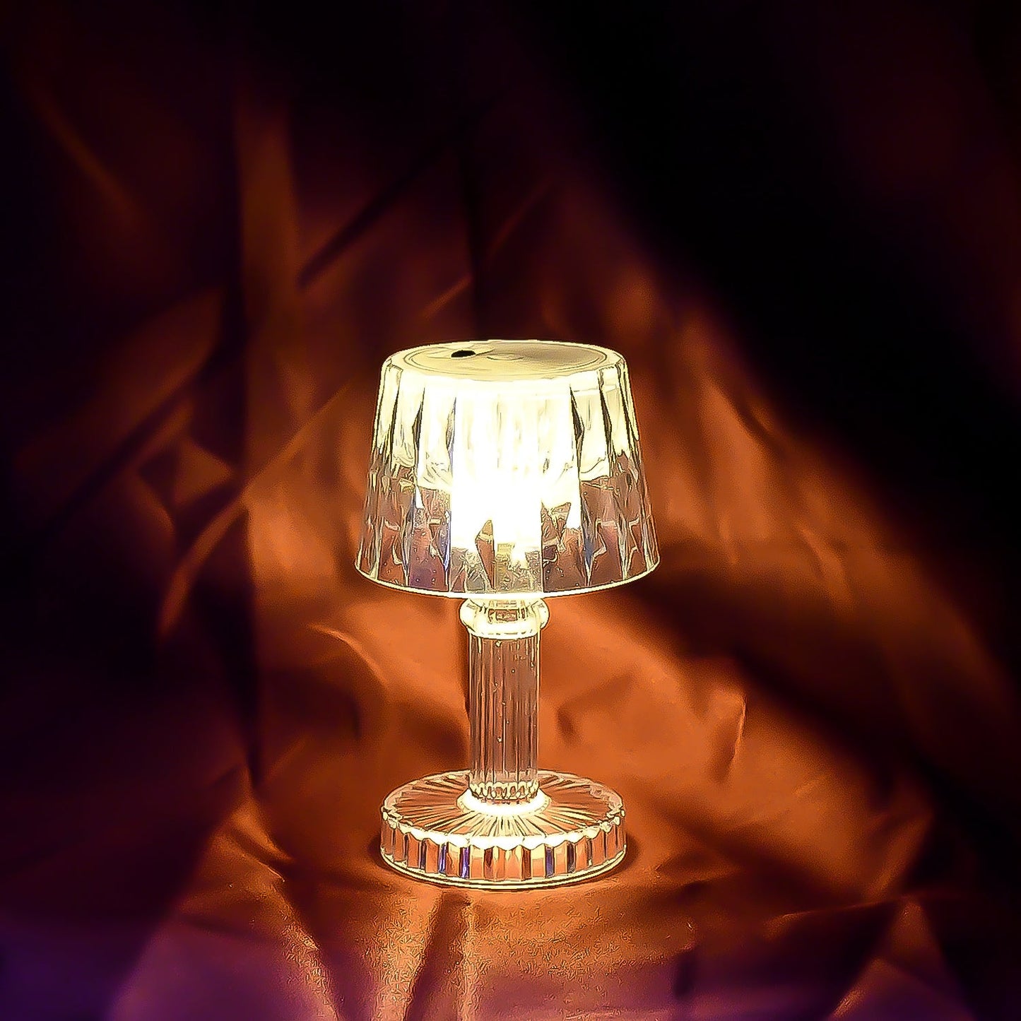 Small portable LED candle lamp by Wukusy, plastic table lamp for home improvement, showing a soft glowing light.