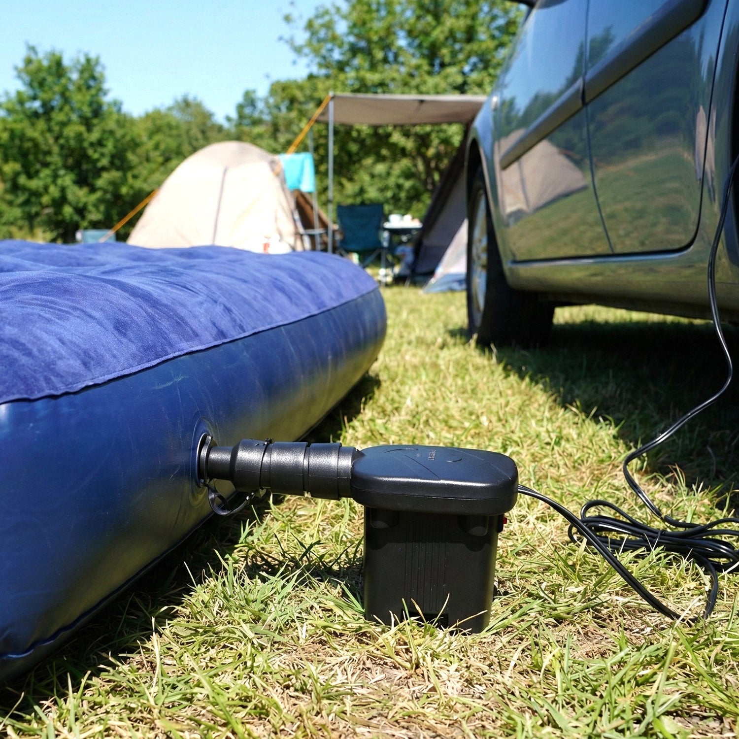 Wukusy portable electric air pump inflator set with car charging adapter, compact device for inflating tires and inflatables.