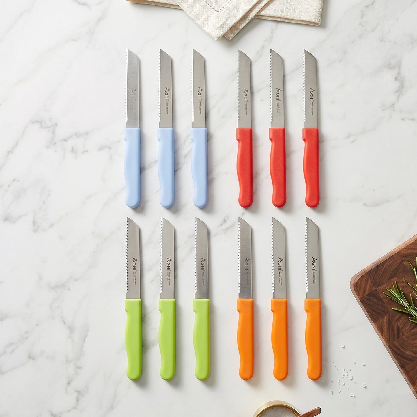 Wukusy 12-piece stainless steel kitchen knife set with plastic handles, including vegetable and fruit knives on a white background.