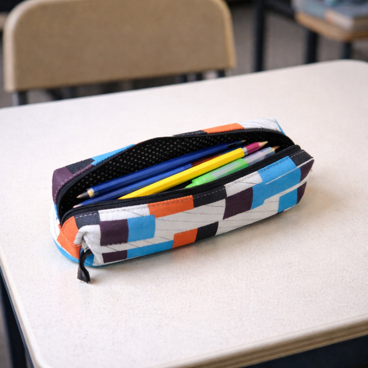 Wukusy printed zipper pencil pouch organizer with multiple compartments, designed for students to store pens, pencils, and stationery.