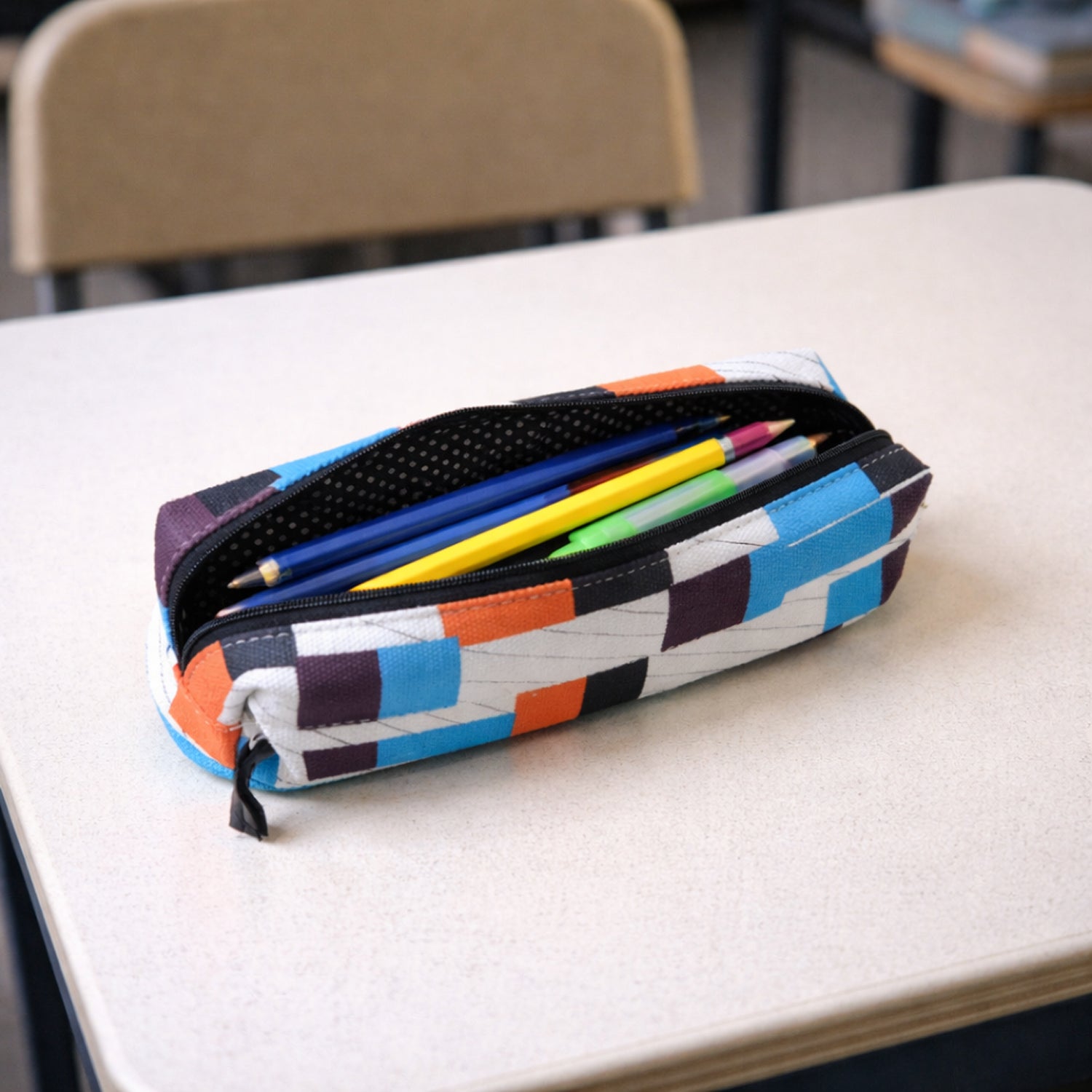 Wukusy printed zipper pencil pouch organizer with multiple compartments, designed for students to store pens, pencils, and stationery.