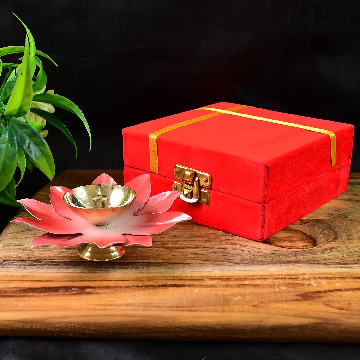 Brass lotus-shaped oil diya for home decor, featuring intricate design and traditional craftsmanship by Wukusy.