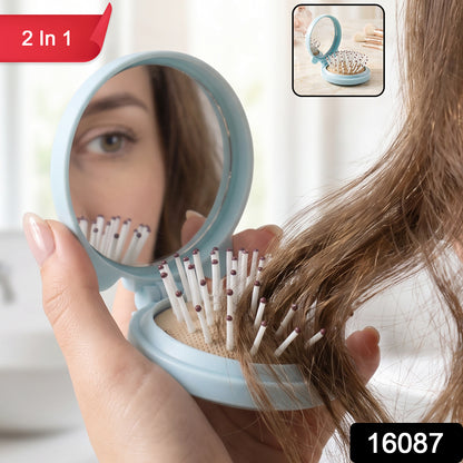 Wukusy 2-in-1 folding hair brush with mirror and compact design, suitable for travel, shown with open brush and mirror.