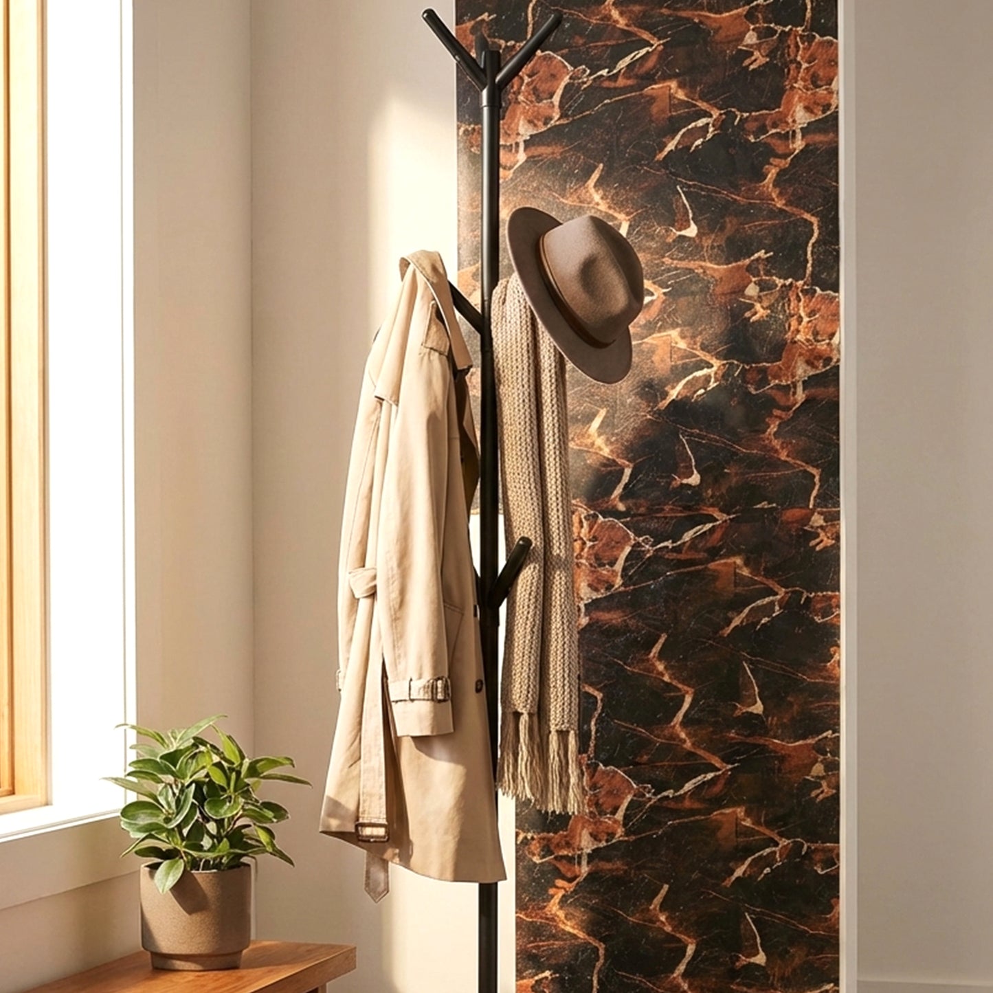 Wukusy floor standing metal coat rack with multiple hooks for hanging coats, hats, and accessories in entryway or hallway.