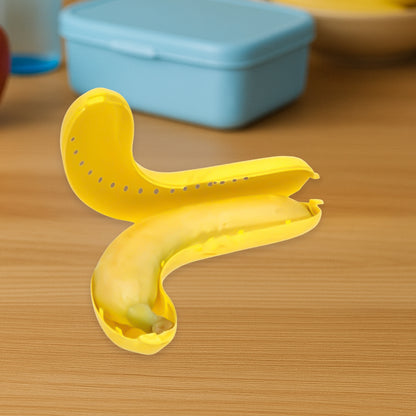 Yellow Wukusy banana-shaped lunch box, kitchen tool, with secure lid and compact design for easy food storage.
