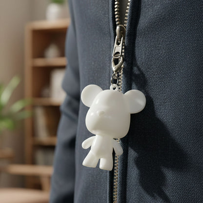 Cute bear figure keychain from Wukusy, featuring a small plush-style bear design perfect for attaching to keys or bags.