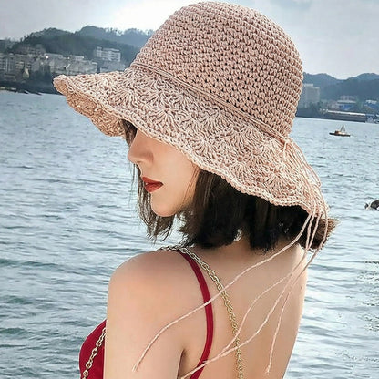 Wukusy stylish handwoven wide brim summer sun hat with a natural straw appearance and a relaxed, breathable design.