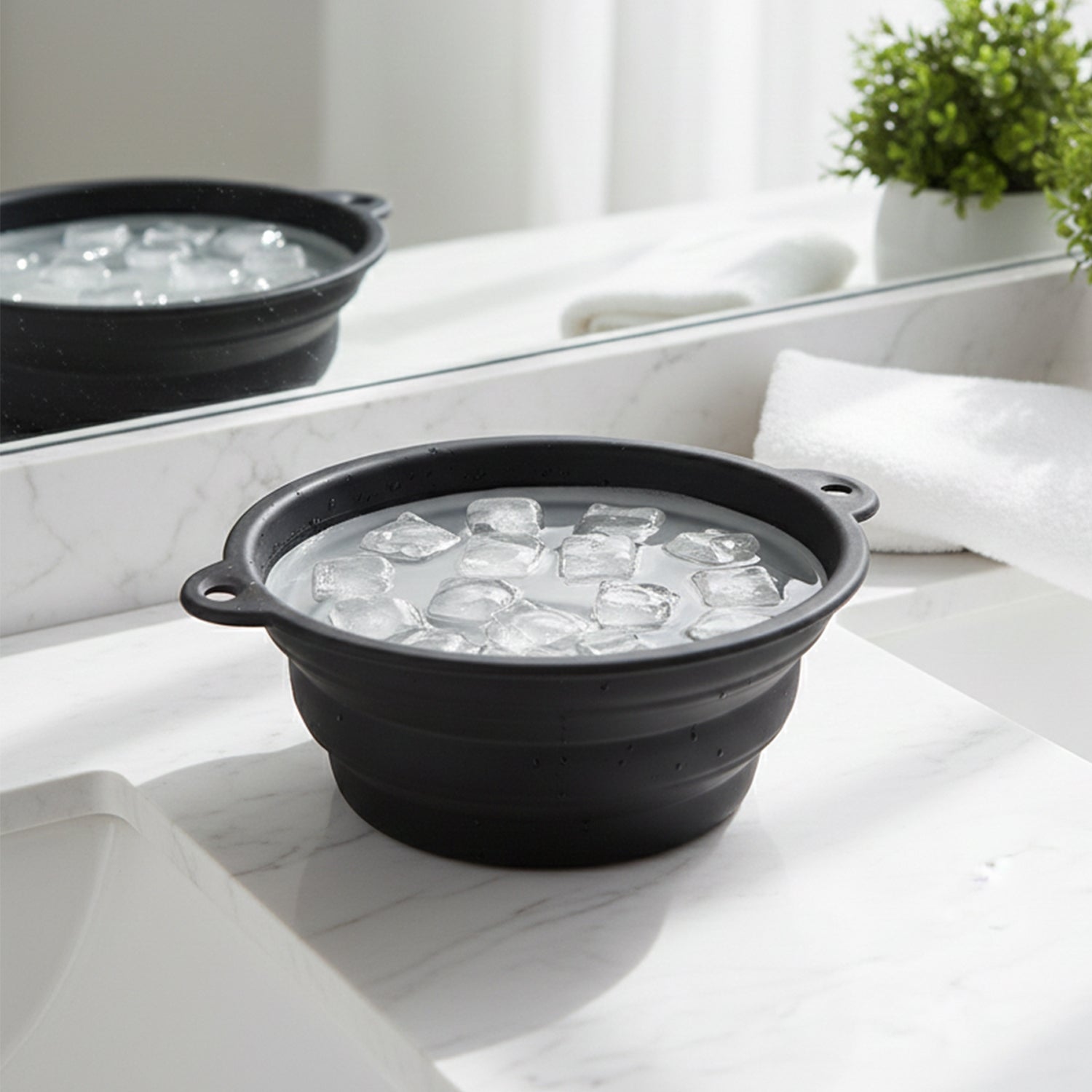 Wukusy portable foldable silicone ice bath bowl, compact and flexible for easy storage and use during cold therapy sessions.
