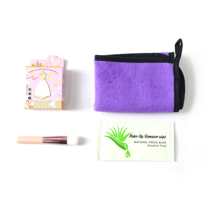 Wukusy 4 in 1 beauty care essentials gift set with skincare bottles and tools arranged on a white background