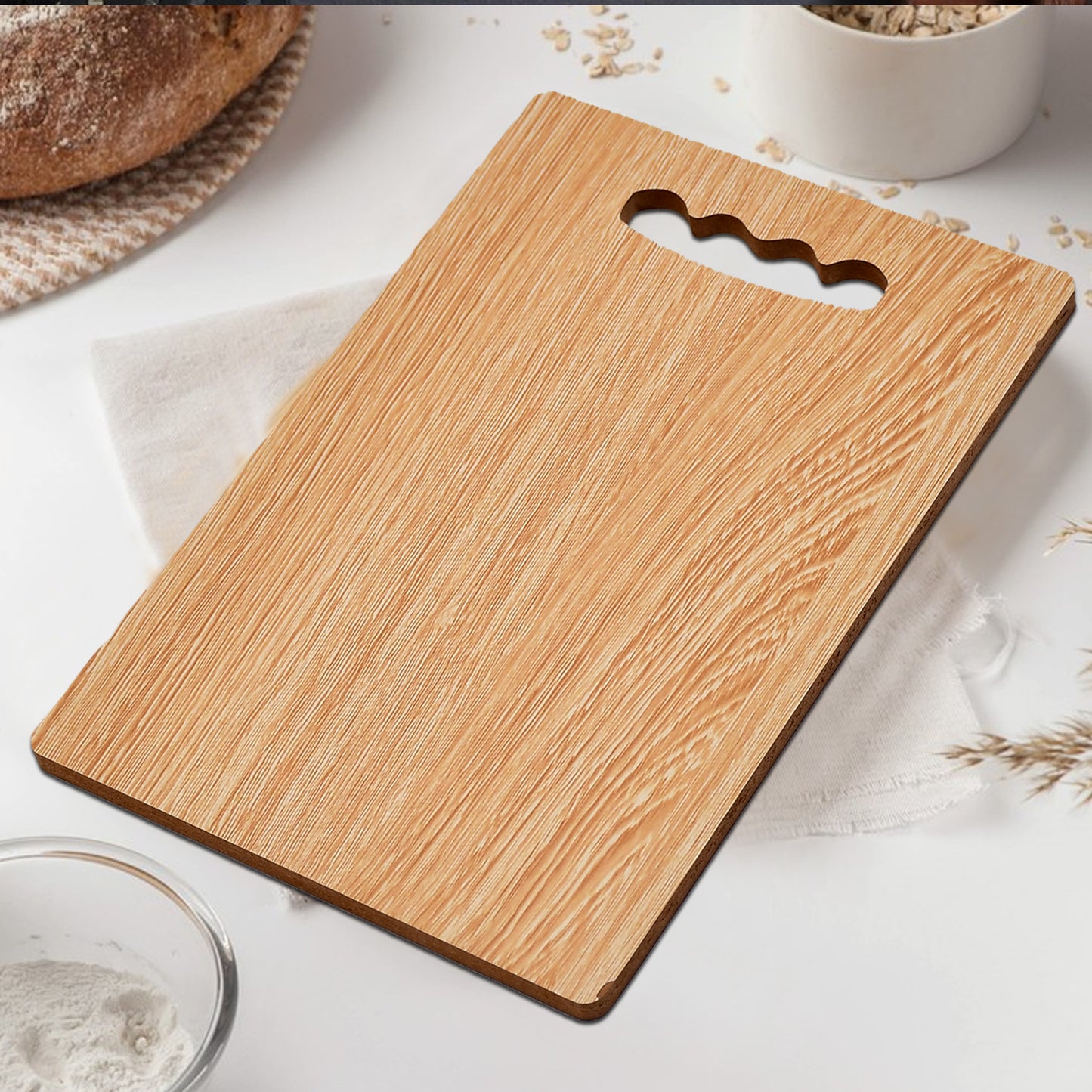 Wukusy 7124 wooden chopping board, 26x17 inches, used for chopping vegetables and fruits in a home kitchen setting