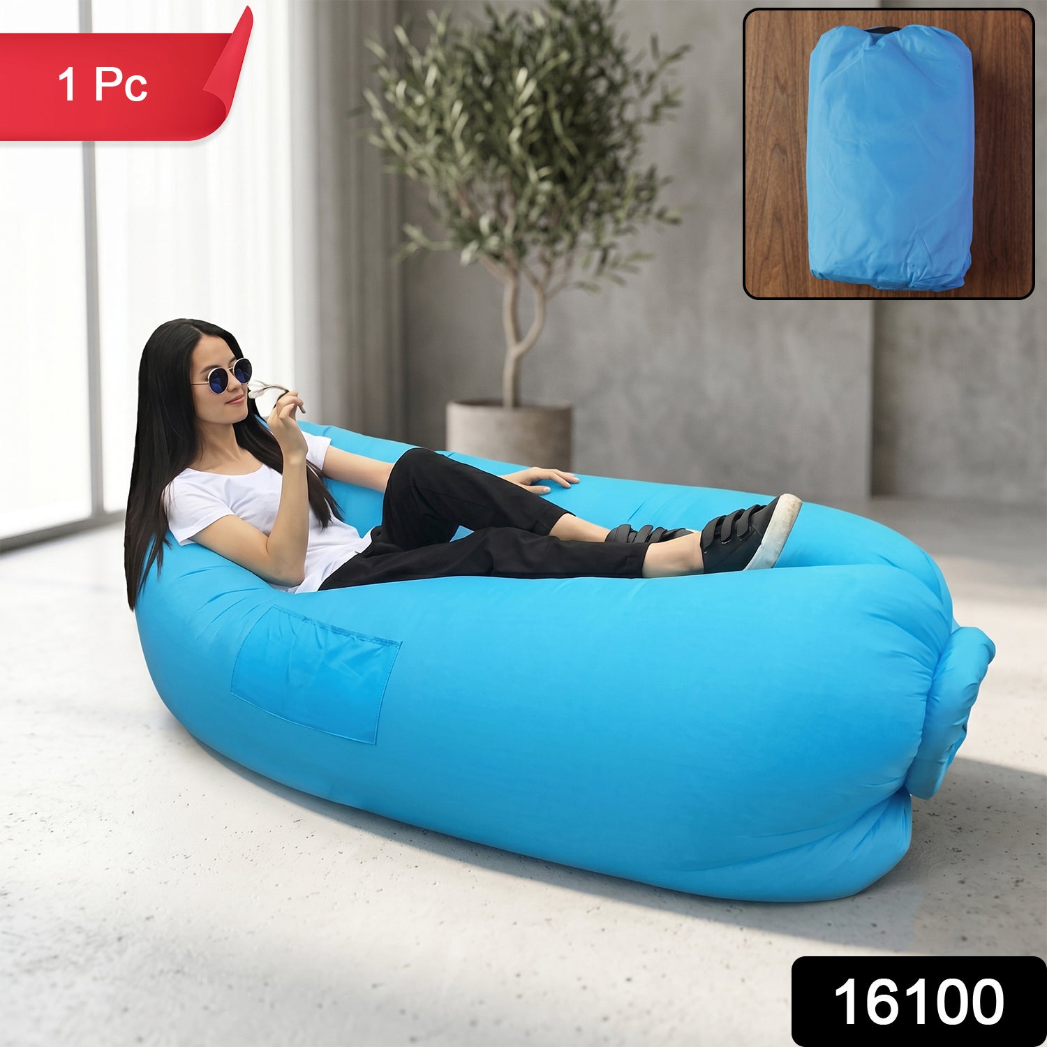 Wukusy inflatable air lounger sofa for outdoor camping, beach, and pool, shown fully inflated on grass with blue sky background.