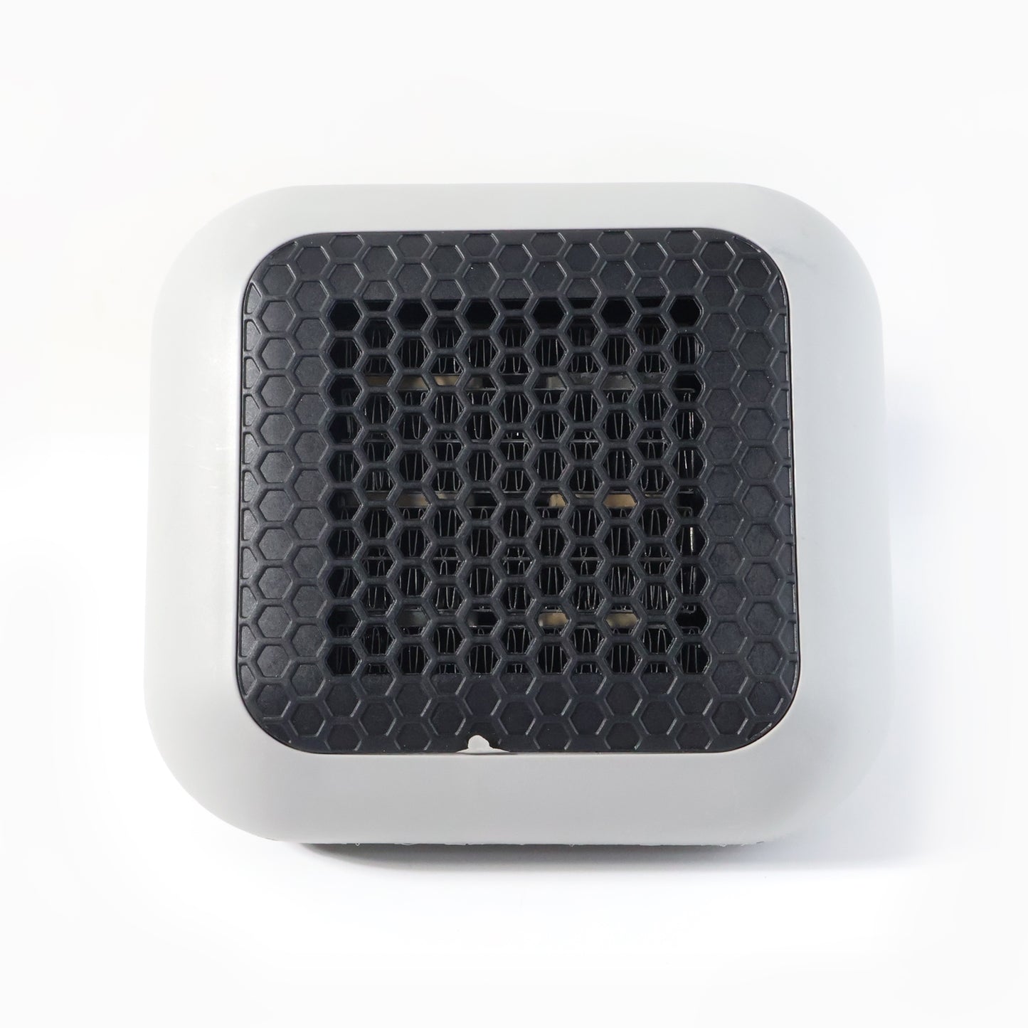 Wukusy 600w wall-mounted plug-in room heater for office use with power converter, shown mounted on a wall.