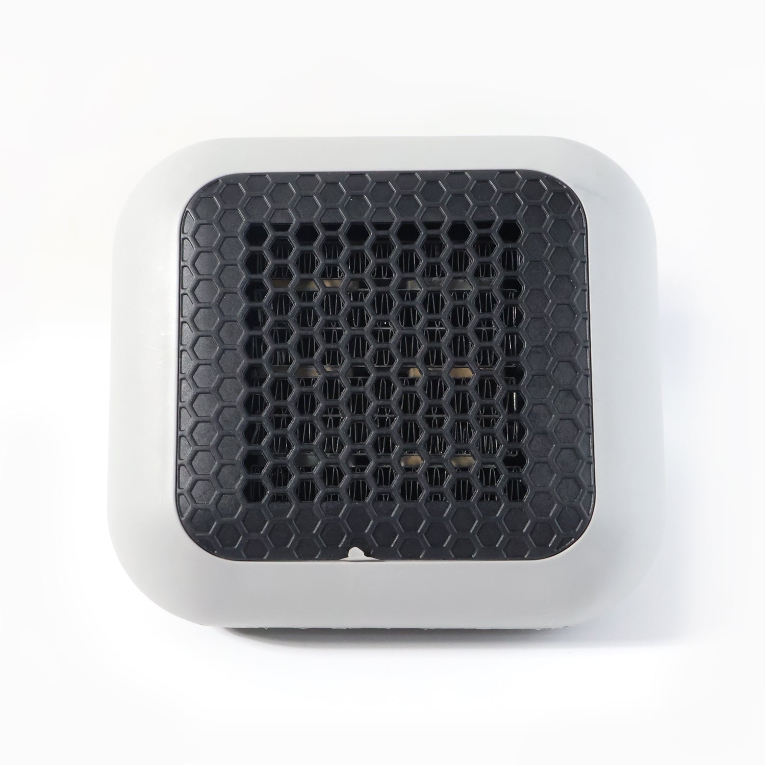 Wukusy 600w wall-mounted plug-in room heater for office use with power converter, shown mounted on a wall.