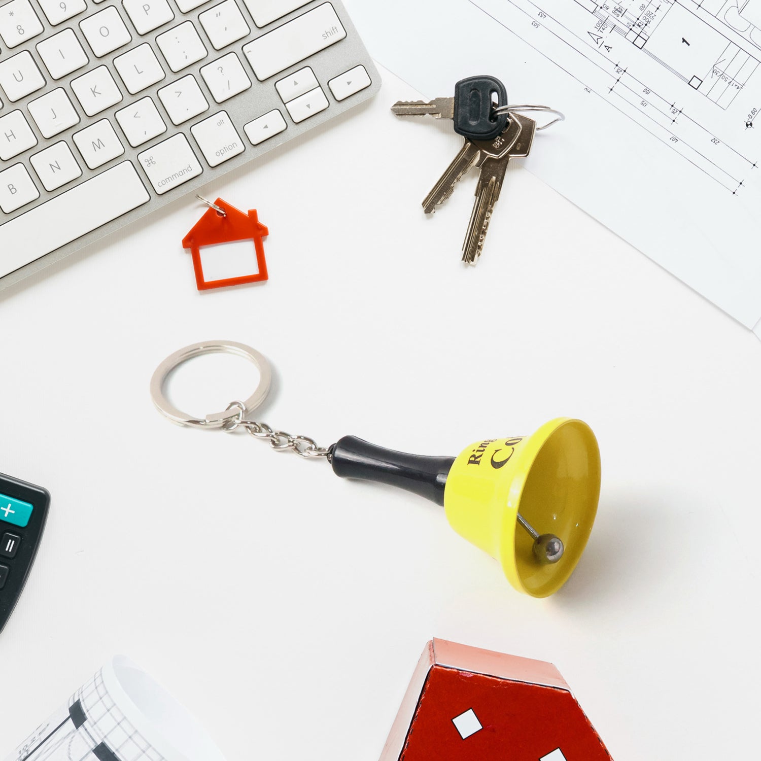 Wukusy mini hand bell with keychain, compact metal bell attached to a keyring, perfect for keys or decorative use