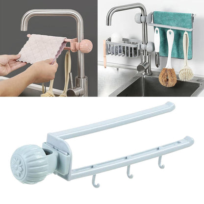 Wukusy multipurpose sink faucet hanging towel and cleaning tool holder attached to a kitchen sink.