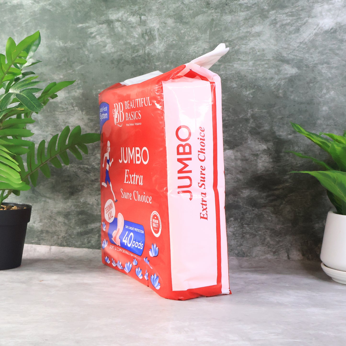 Wukusy Beautiful Basics Jumbo Extra Sure Choice sanitary pads, XXL 330mm, 40-pack, shown with absorbent surface and soft material