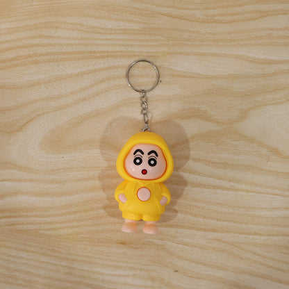Wukusy cute face-changing doll keychain toy showing a playful, expressive face with vibrant colors and a small keyring attachment