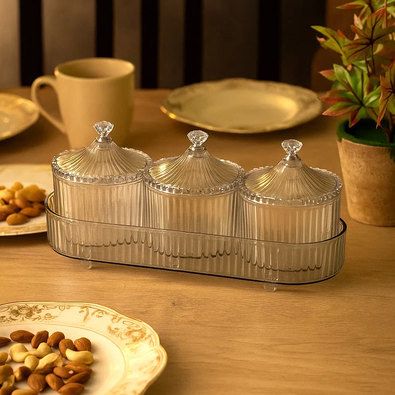 Wukusy dry fruit snack storage set with three clear plastic containers for kitchen organization and fruit preservation.