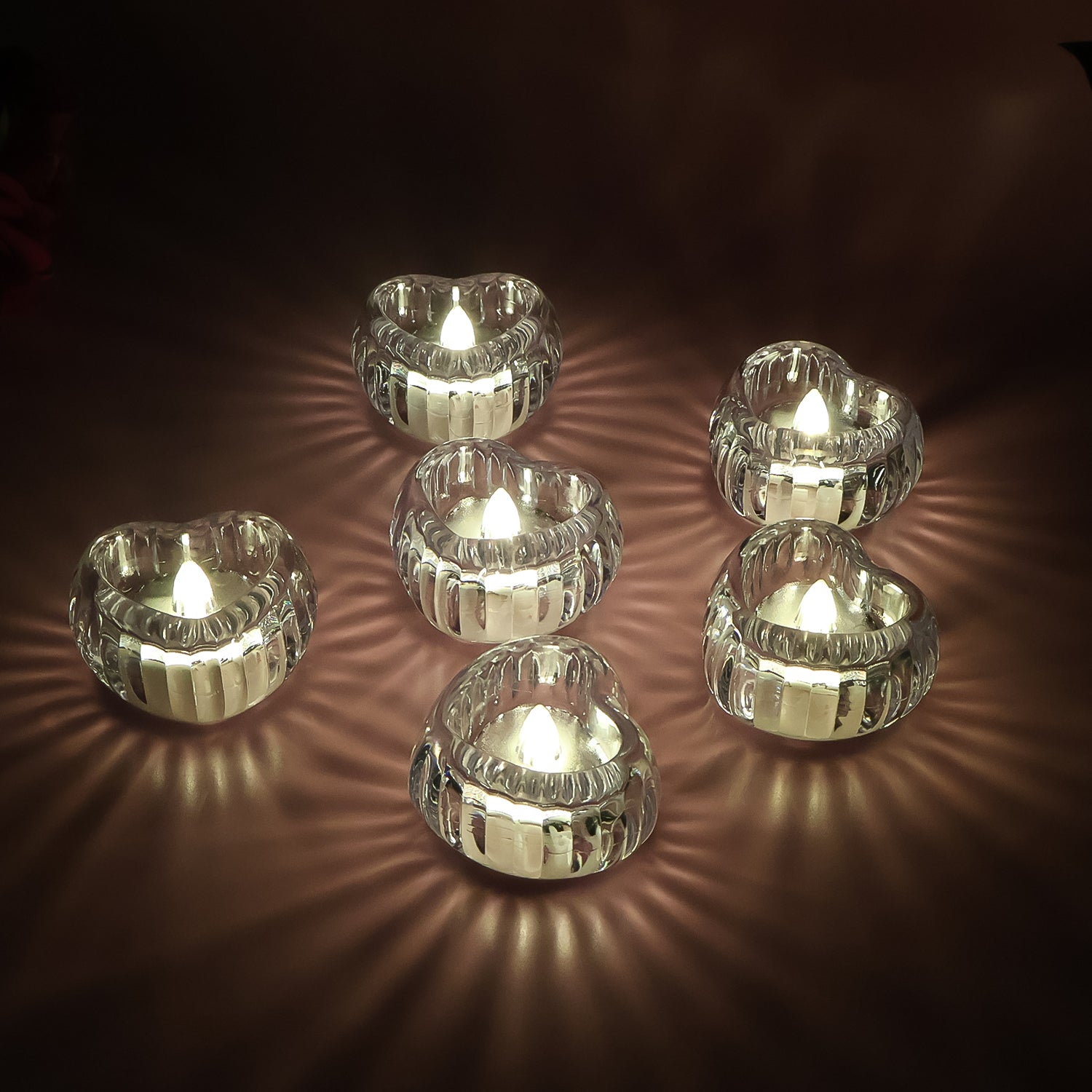 Six Wukusy LED crystal tealight candles for home decor, flameless with a soft, glowing light, perfect for decorative ambiance.