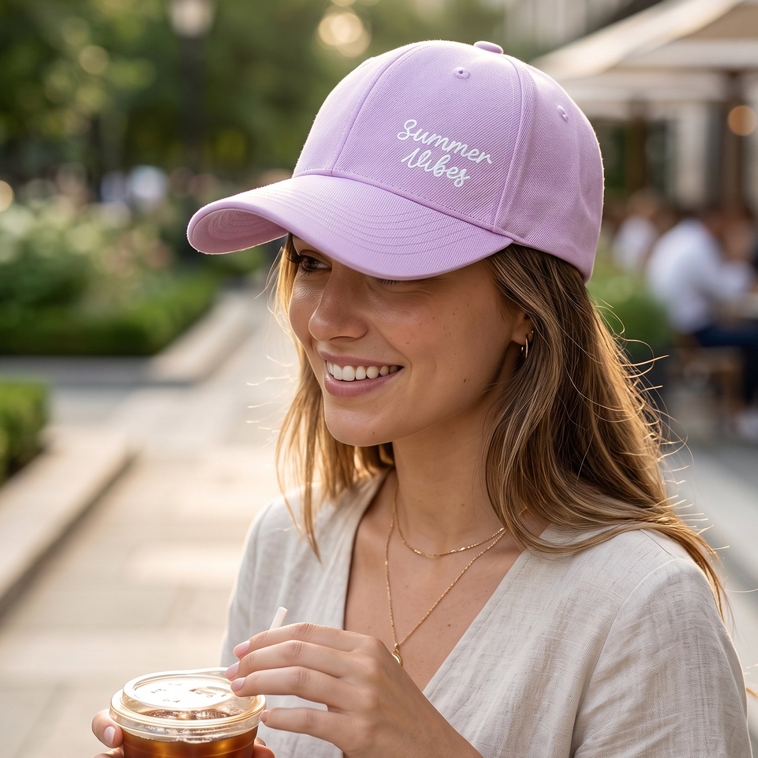 Wukusy stylish summer embroidered baseball cap for men and women, featuring vibrant summer-themed embroidery on a casual cap.