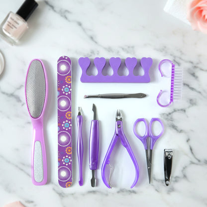 Wukusy 10-piece personal grooming manicure and pedicure nail care tool set with clippers, files, and cuticle tools on white background.
