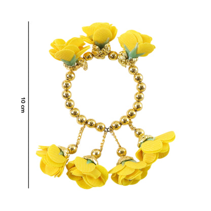Traditional Pooja wrist ornament Haldi Kada bracelet by Wukusy, showcasing a gold-tone decorative bracelet with intricate design.