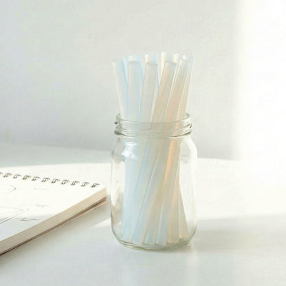 Wukusy hot glue stick set with 10 strong 20 cm adhesive glue sticks for crafting projects, shown stacked in a pile.
