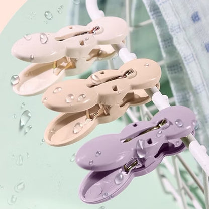 Wukusy clothes drying rope with colorful cloth clips for indoor and outdoor use, ideal for drying laundry efficiently.