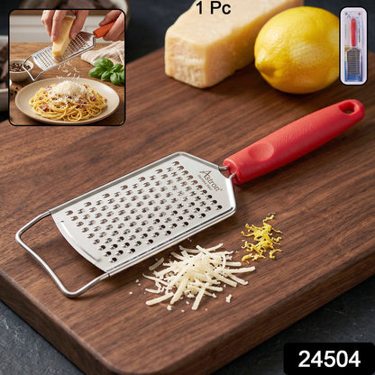 Wukusy handheld cheese grater with plastic handle, designed for grating vegetables, lemon zest, and cheese, shown with grating surface visible.