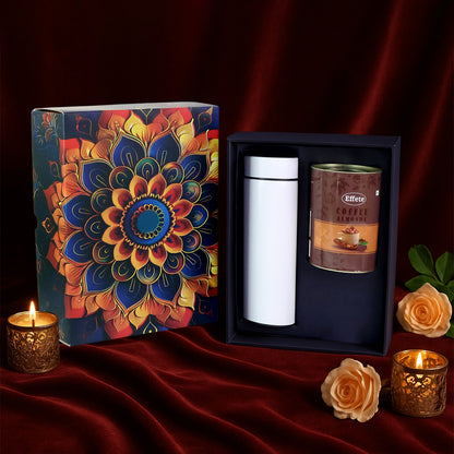Wukusy Effete Coffee Almonds gift hamper with golden packaging and a bottle, featuring two pieces in a home and kitchen setting.