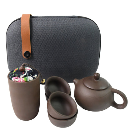 Wukusy portable Kung Fu tea set with six pieces in a travel bag, ideal for home decor and tea ceremonies.