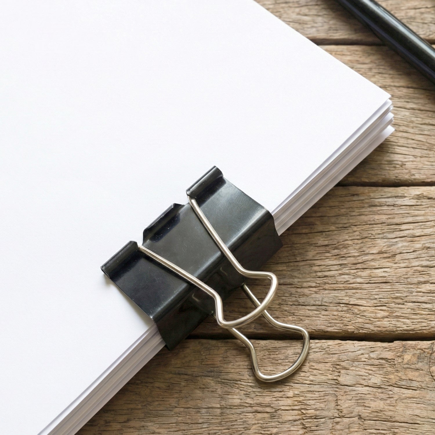 Set of 12 extra large heavy-duty black binder clips from Wukusy, 41mm size for secure paper organization.