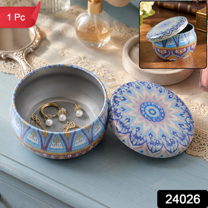 Wukusy metal mandala tin box with decorative round design, ideal for candles or trinkets, featuring intricate patterns and a shiny finish.