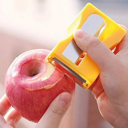 Wukusy multipurpose vegetable peeler tool with ergonomic handle for peeling and sharpening vegetables, shown in close-up.