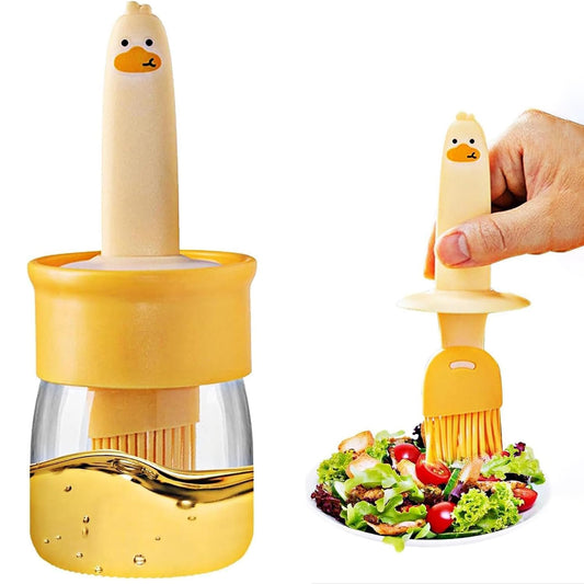 Wukusy 2-in-1 oil dispenser bottle with silicone basting brush for kitchen use, featuring a transparent container and soft silicone brush.