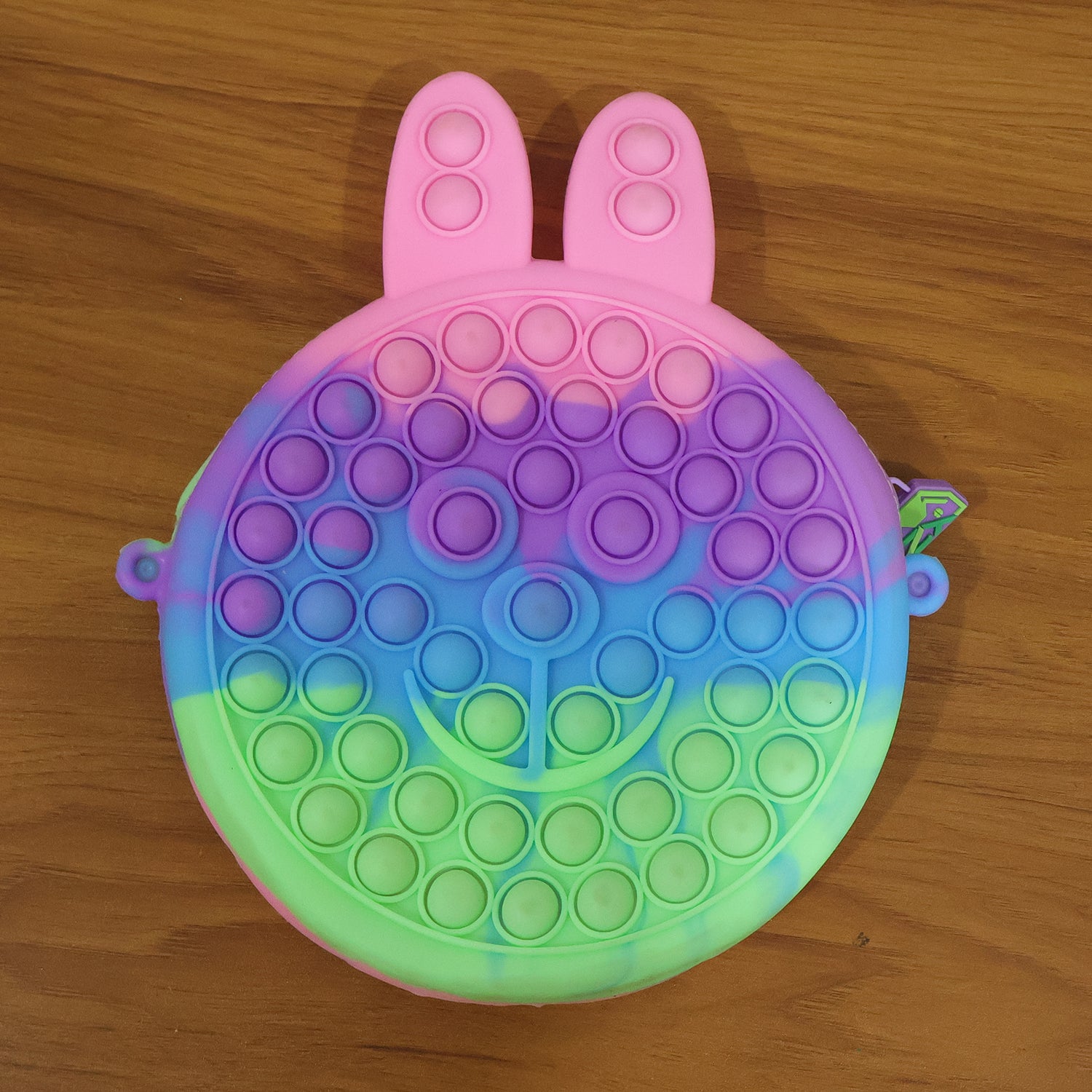 Wukusy cute caterpillar shape silicone pencil pouch with pop it bubbles, colorful and fun stationery organizer for kids.
