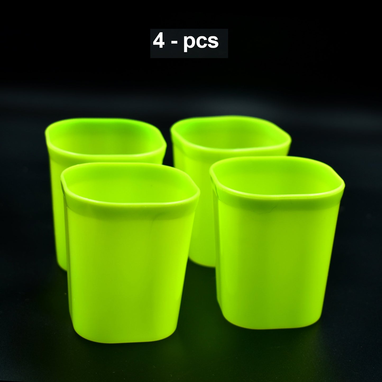 Set of four Wukusy plastic drinking glasses for milk, water, and juice, ideal for home and kitchen use.